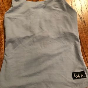 NWOT. Light Blue Backless Yoga Top. Size Medium